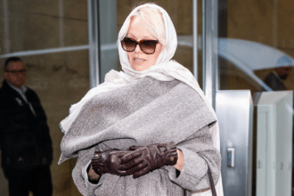 Pamela Anderson Expands Her Impressive Collection with a ,400 Ferragamo Scarf Coat